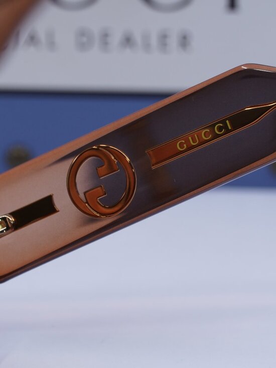 Gucci GG1553S 004 Oval Sunglasses - Amber / Brown main image 10